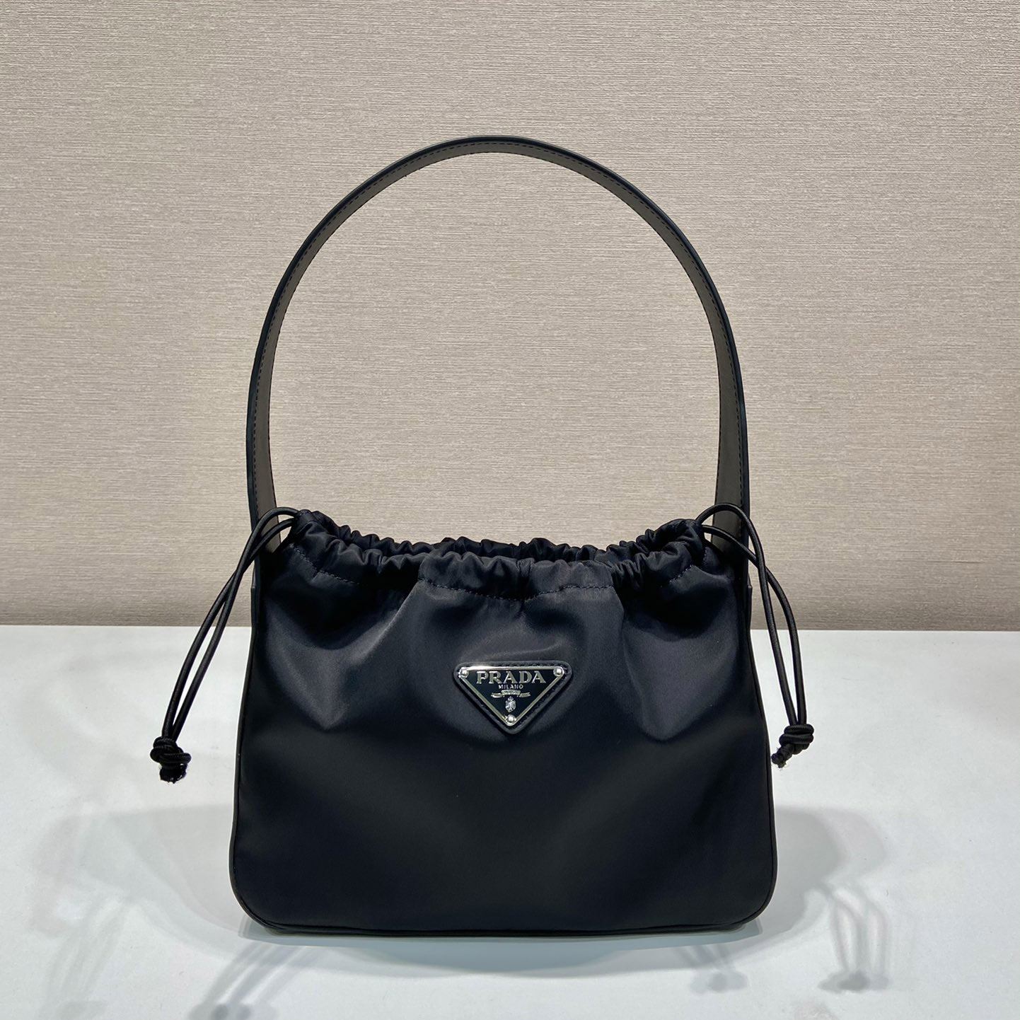 Pra*a top handle bags